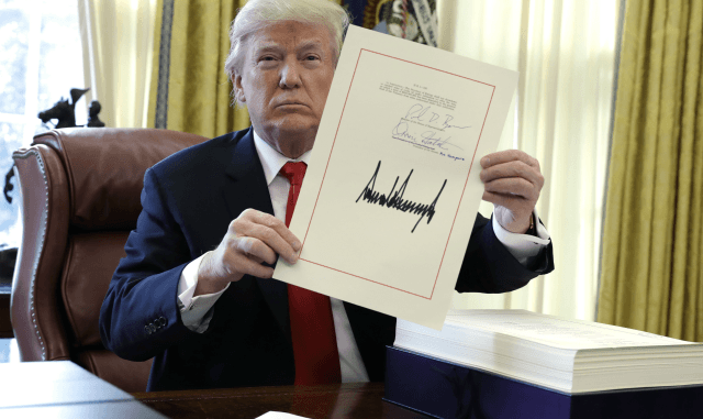 Trump signs tax cut